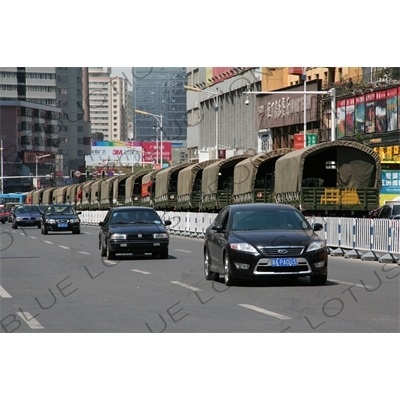 Chinese People's Armed Police Force/PAP (Zhongguo Renmin Wuzhuang Jingcha Budui/Wujing) Personnel Transport Vehicles on a Street in Urumqi