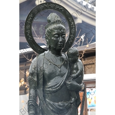 Jizo Statue Holding a Baby in Zenko-ji in Nagano