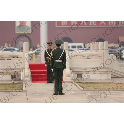 Soldiers Changing the Guard at the Base of the Flagpole in Tiananmen Square in Beijing