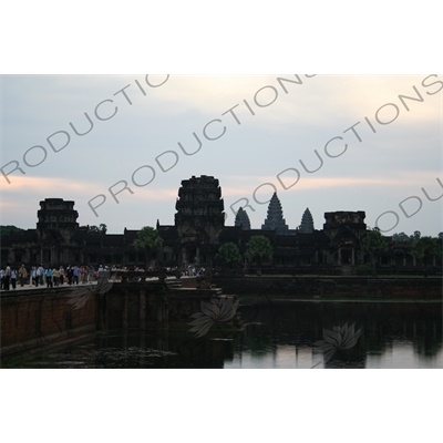 People Walking along Causeway Leading to Angkor Wat