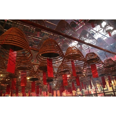 Burning Incense Cones inside Man Mo Temple in Hong Kong