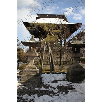 Stone Lanterns and Bell Tower (Shoro) of Zenko-ji in Nagano