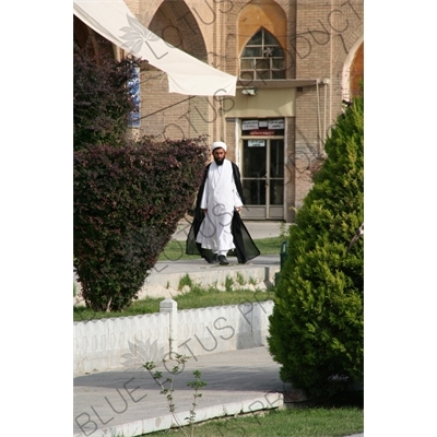 Muslim Cleric Walking through Naqsh-e Jahan Square in Esfahan/Isfahan