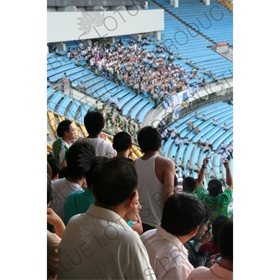 Beijing Guoan Fans Shouting Abuse at Dalian Shide Fans During a Chinese Super League Match at the Workers' Stadium (Gongren Tiyuchang) in Beijing