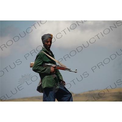 Man with AK-47 in Simien Mountains National Park