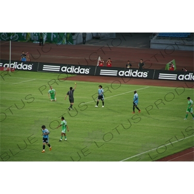 Yellow Card During a Chinese Super League Match between Beijing Guoan and Dalian Shide at the Workers' Stadium (Gongren Tiyuchang) in Beijing