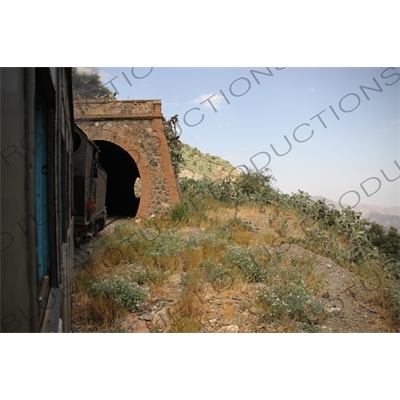 Vintage Steam Engine Travelling through a Tunnel on the Asmara to Massawa Railway Line