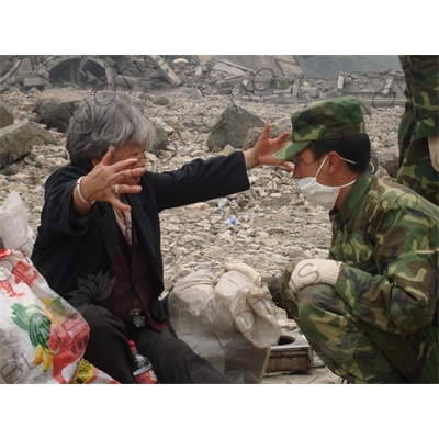 Soldier Helping an Elderly Resident After the Sichuan Earthquake