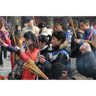 People Burning Incense in the Lama Temple (Yonghegong) in Beijing