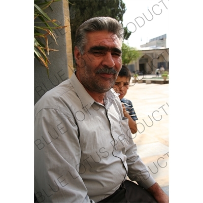 Man inside the Shah Cheragh Mosque in Shiraz