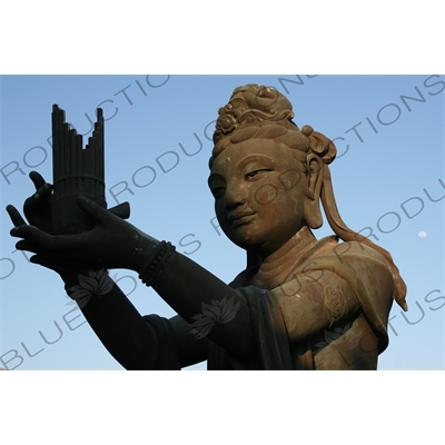 'Offering of the Six Devas' Statues in front of the Big Buddha (Tiantan Da Fo) Statue on Lantau in Hong Kong