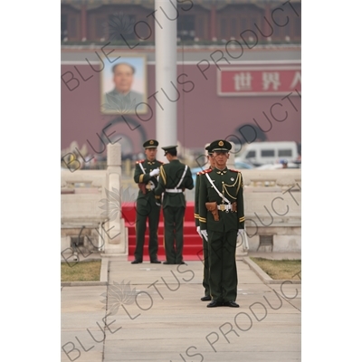 Soldiers Changing the Guard at the Base of the Flagpole in Tiananmen Square in Beijing