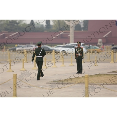 Soldiers Changing the Guard at the Base of the Flagpole in Tiananmen Square in Beijing