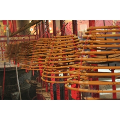 Burning Incense Cones inside Man Mo Temple in Hong Kong