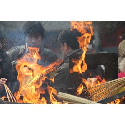 People Burning Incense in the Lama Temple (Yonghegong) in Beijing