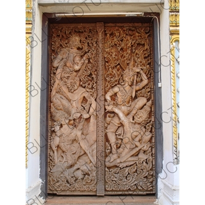 Carved Wooden Door in a Temple near the Mekong River