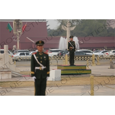 Soldiers Standing Guard at the Base of the Flagpole in Tiananmen Square in Beijing