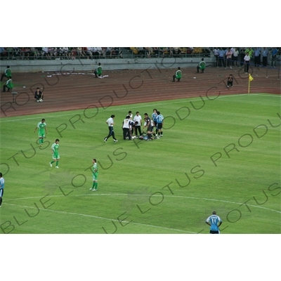 Injured Player During a Chinese Super League Match between Beijing Guoan and Dalian Shide at the Workers' Stadium (Gongren Tiyuchang) in Beijing