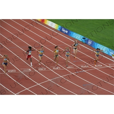 Athletes at the End of a Women's 100 Metres Heat in the Bird's Nest/National Stadium (Niaochao/Guojia Tiyuchang) in the Olympic Park in Beijing