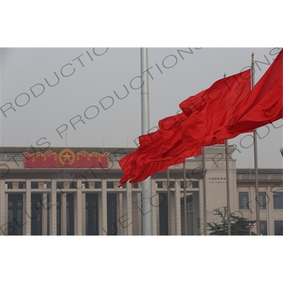 Red Flags and National Museum of China (Zhongguo Guojia Bowuguan) in Tiananmen Square in Beijing