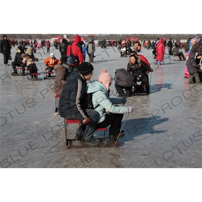 People on Sleds on the Songhua River in Harbin