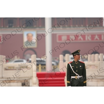 Soldier Standing Guard at the Base of the Flagpole in Tiananmen Square in Beijing