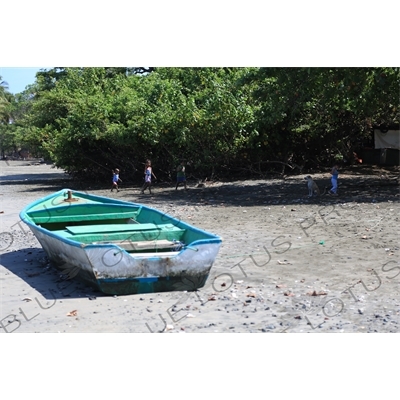 Boat and Children on a Beach in Nosara