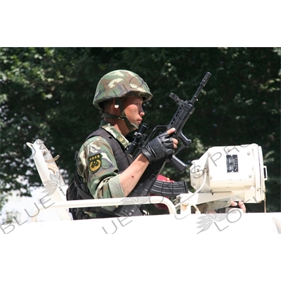 Chinese People's Armed Police Force/PAP (Zhongguo Renmin Wuzhuang Jingcha Budui/Wujing) Officer in an Armoured Personnel Carrier in Urumqi