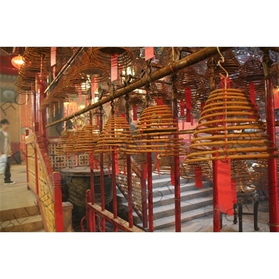 Burning Incense Cones inside Man Mo Temple in Hong Kong