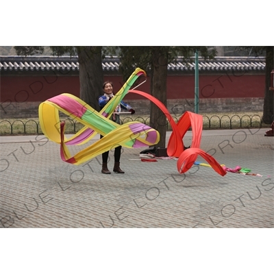 Woman Exercising with Streamers in the Temple of Heaven (Tiantan) in Beijing