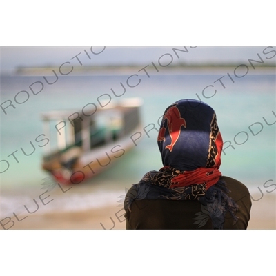 Person on a Beach on Gili Meno