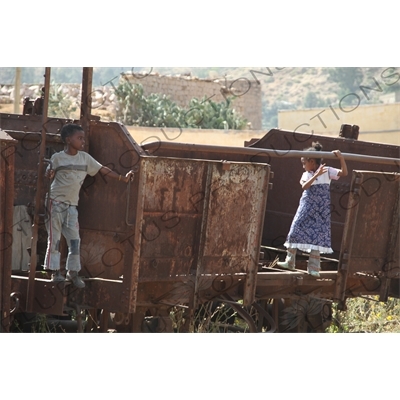 Children Playing on an Old Railway Car in a Station along the Asmara to Massawa Railway Line