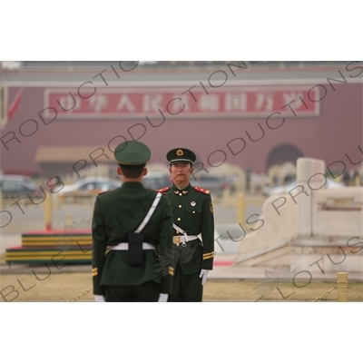 Soldiers Changing the Guard at the Base of the Flagpole in Tiananmen Square in Beijing