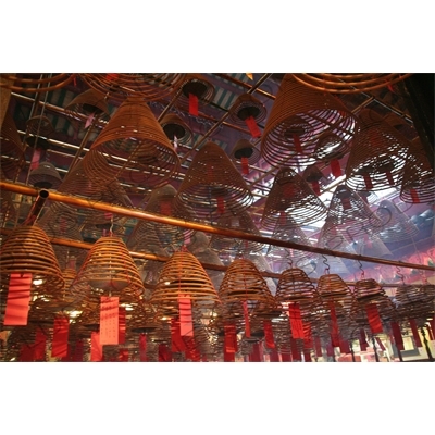 Burning Incense Cones inside Man Mo Temple in Hong Kong