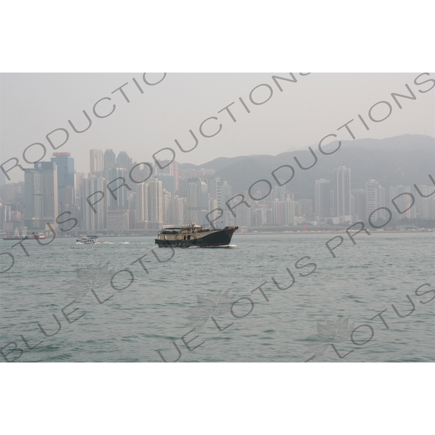 Boat Sailing through Hong Kong Harbour