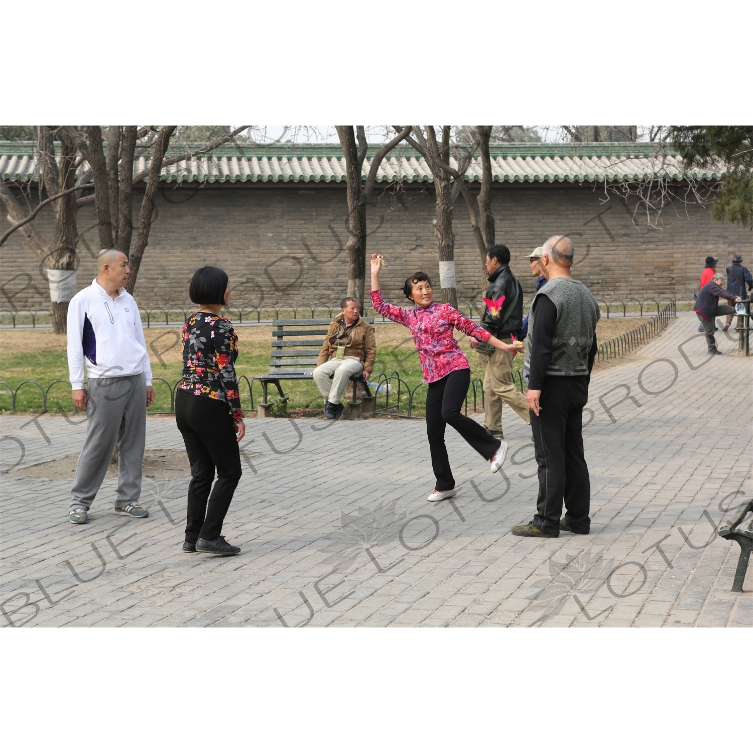 People Playing Shuttlecock (Jianzi/Ti Jianzi/Jianqiu) near the North Gate of the Temple of Heaven (Tiantan) in Beijing