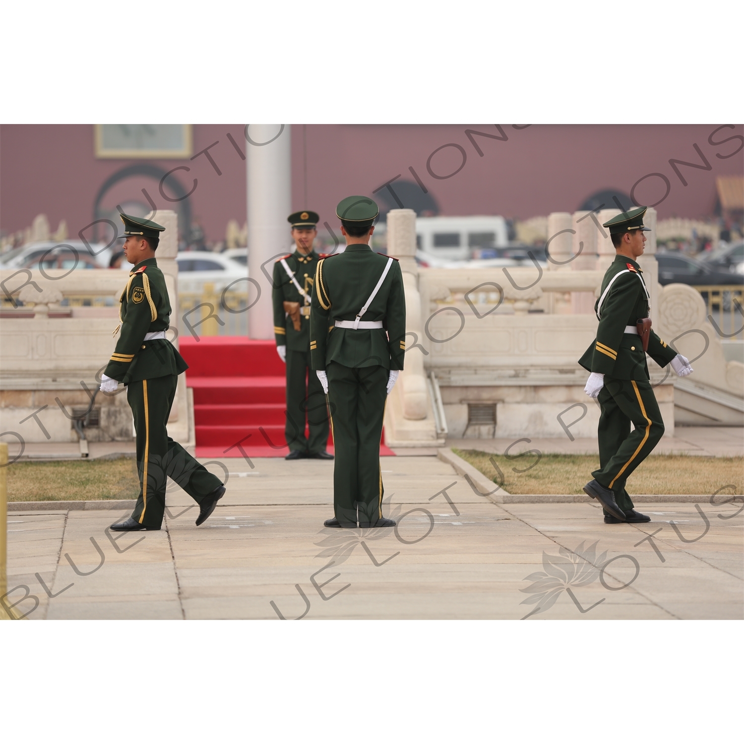 Soldiers Changing the Guard at the Base of the Flagpole in Tiananmen Square in Beijing