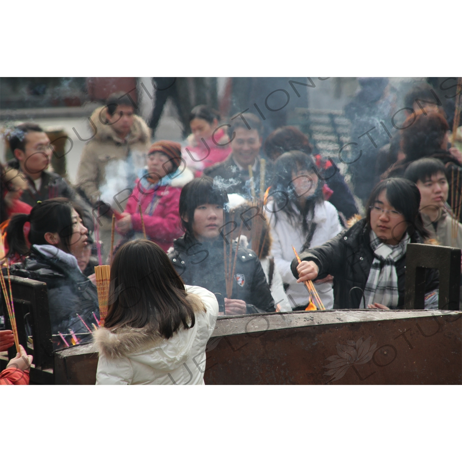 People Burning Incense in the Lama Temple (Yonghegong) in Beijing