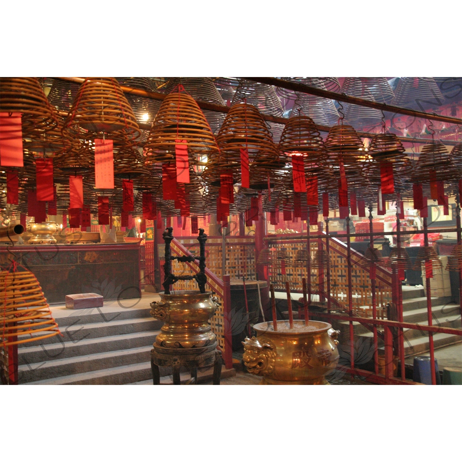 Burning Incense Cones inside Man Mo Temple in Hong Kong