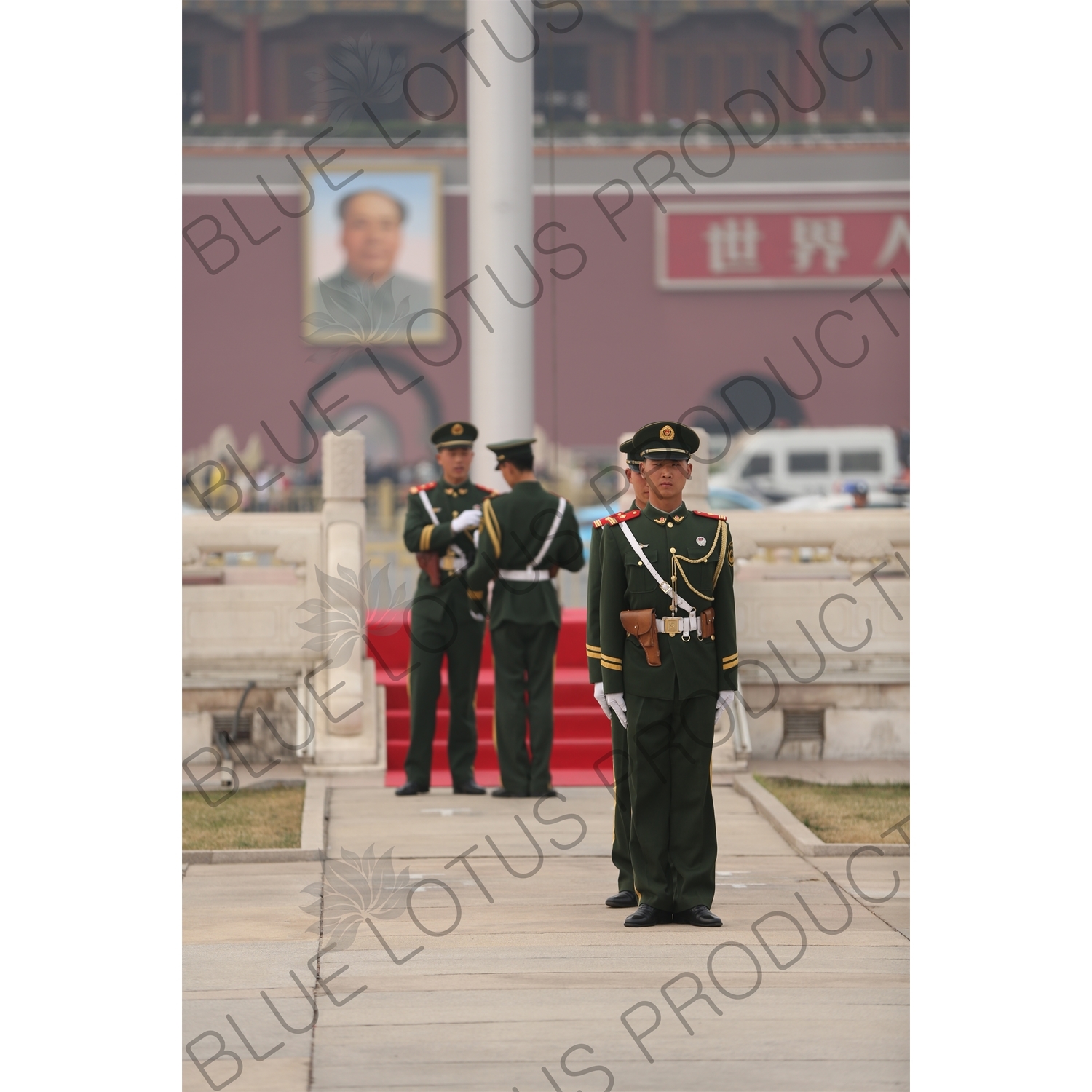 Soldiers Changing the Guard at the Base of the Flagpole in Tiananmen Square in Beijing