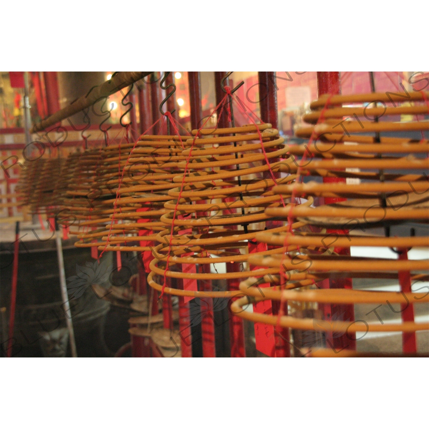 Burning Incense Cones inside Man Mo Temple in Hong Kong