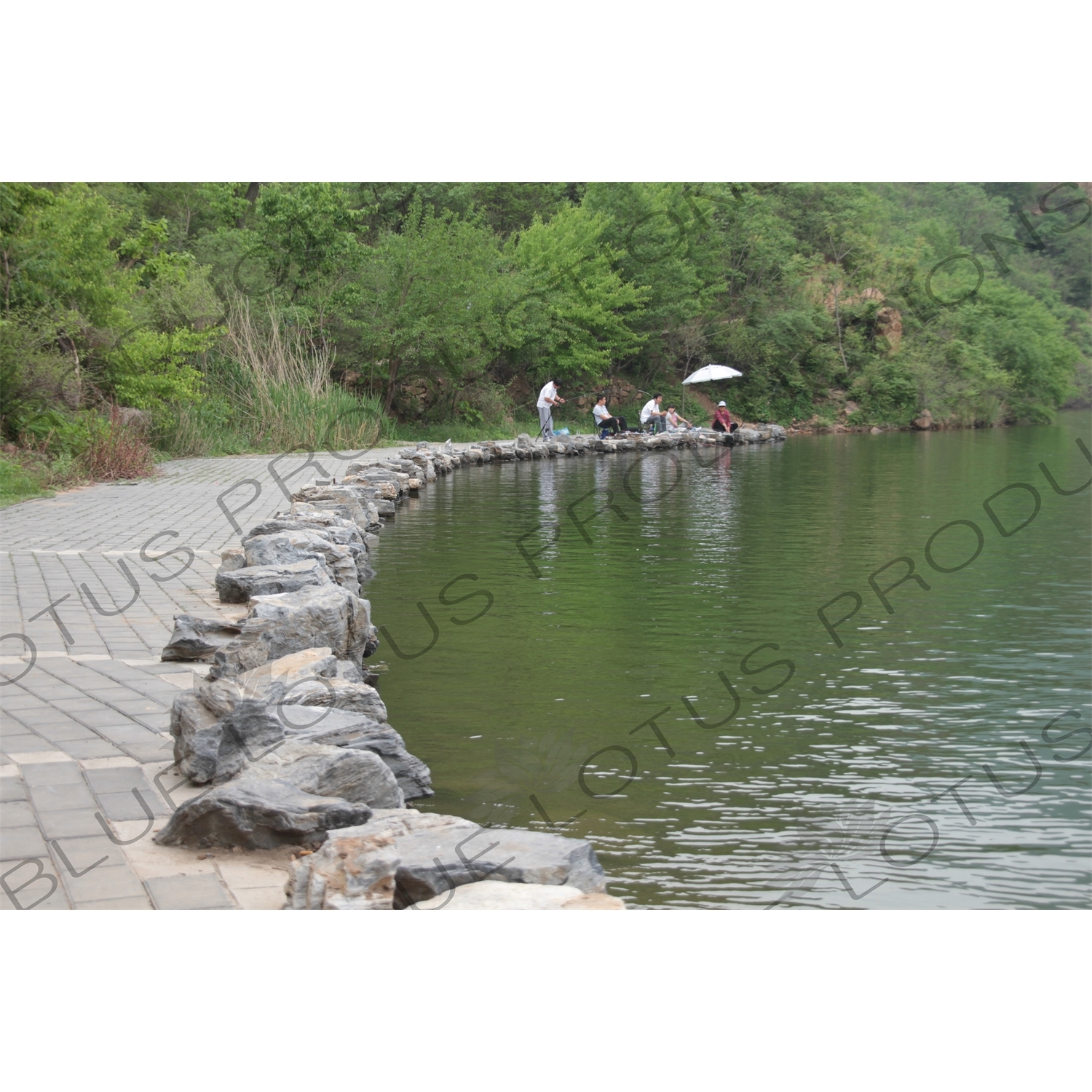 People Fishing in the Reservoir of the Huanghua Cheng Section of the Great Wall of China (Wanli Changcheng) near Beijing