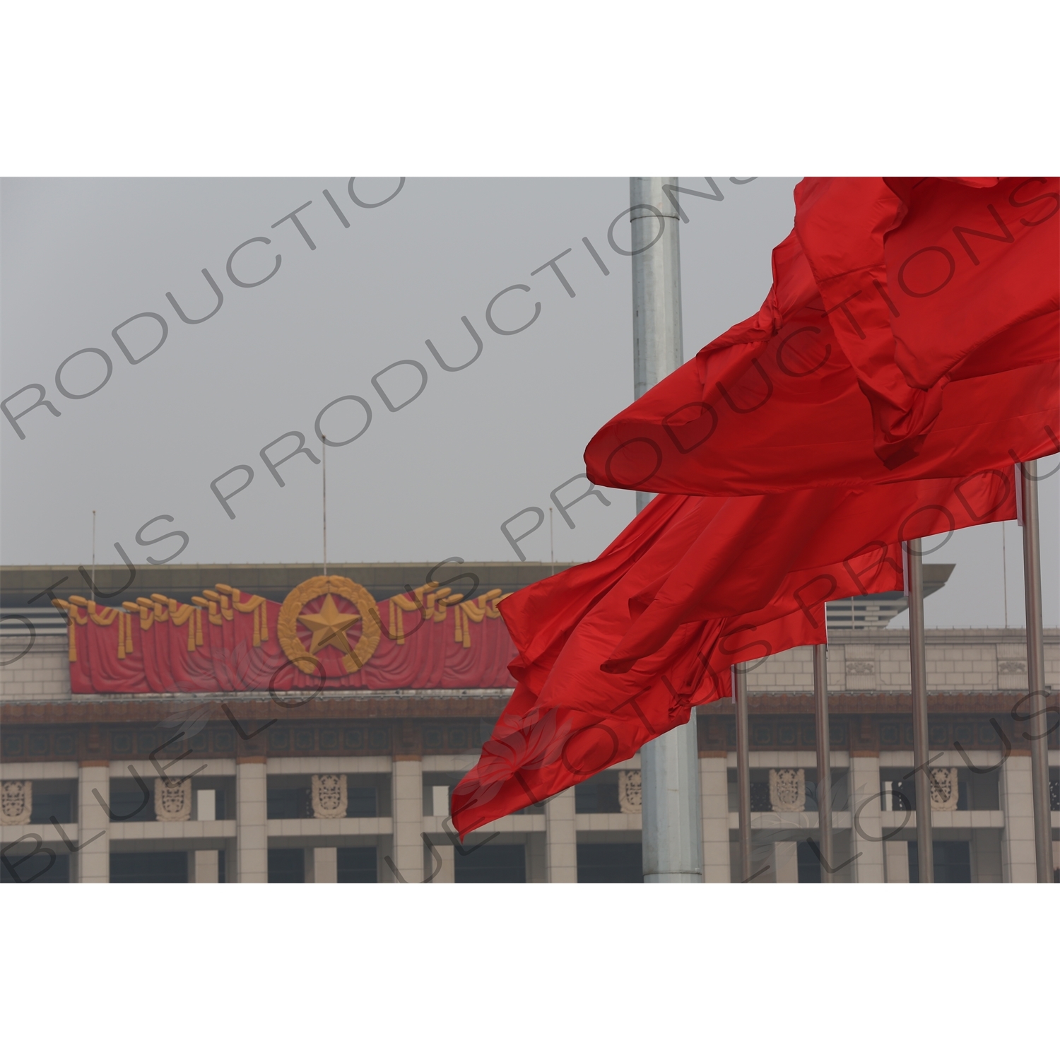 Red Flags and National Museum of China (Zhongguo Guojia Bowuguan) in Tiananmen Square in Beijing