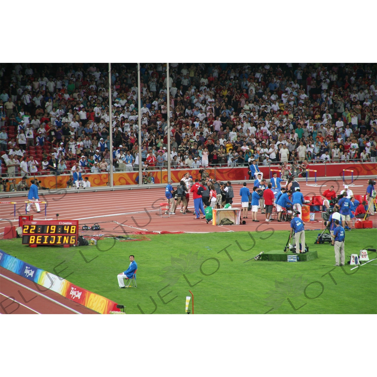 Shot Putter Celebrating in the Bird's Nest/National Stadium (Niaochao/Guojia Tiyuchang) in the Olympic Park in Beijing