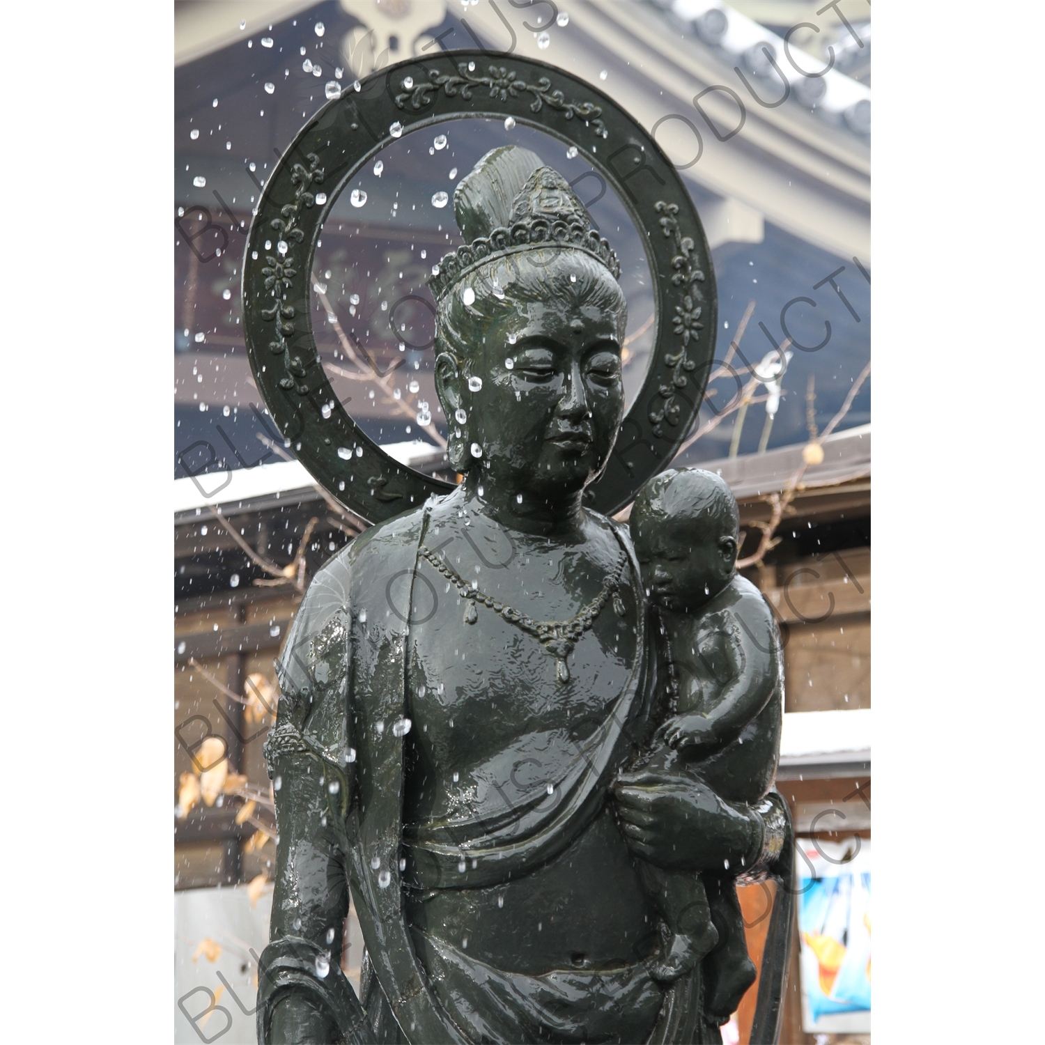 Jizo Statue Holding a Baby in Zenko-ji in Nagano