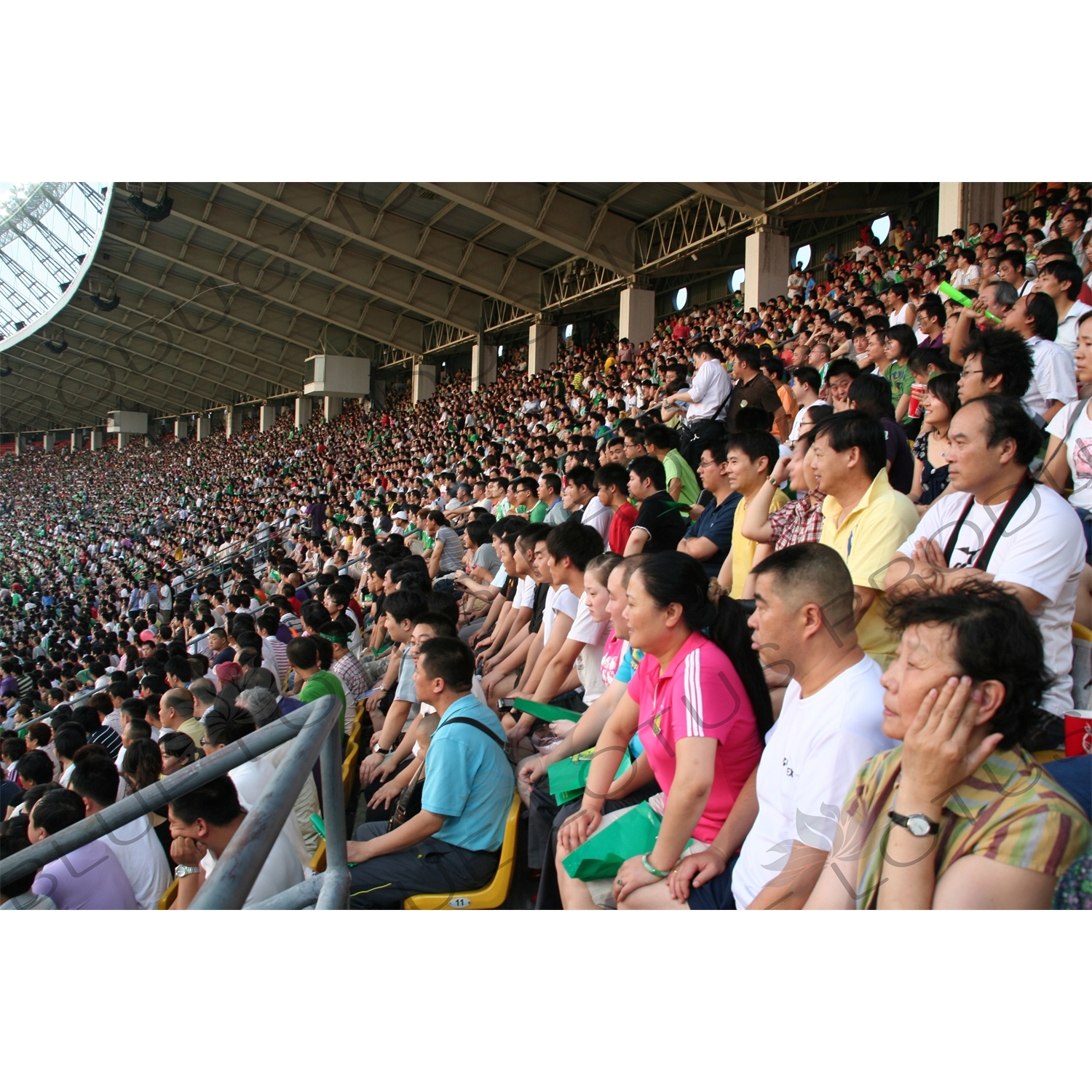 Crowd During a Chinese Super League Match between Beijing Guoan and Dalian Shide at the Workers' Stadium (Gongren Tiyuchang) in Beijing