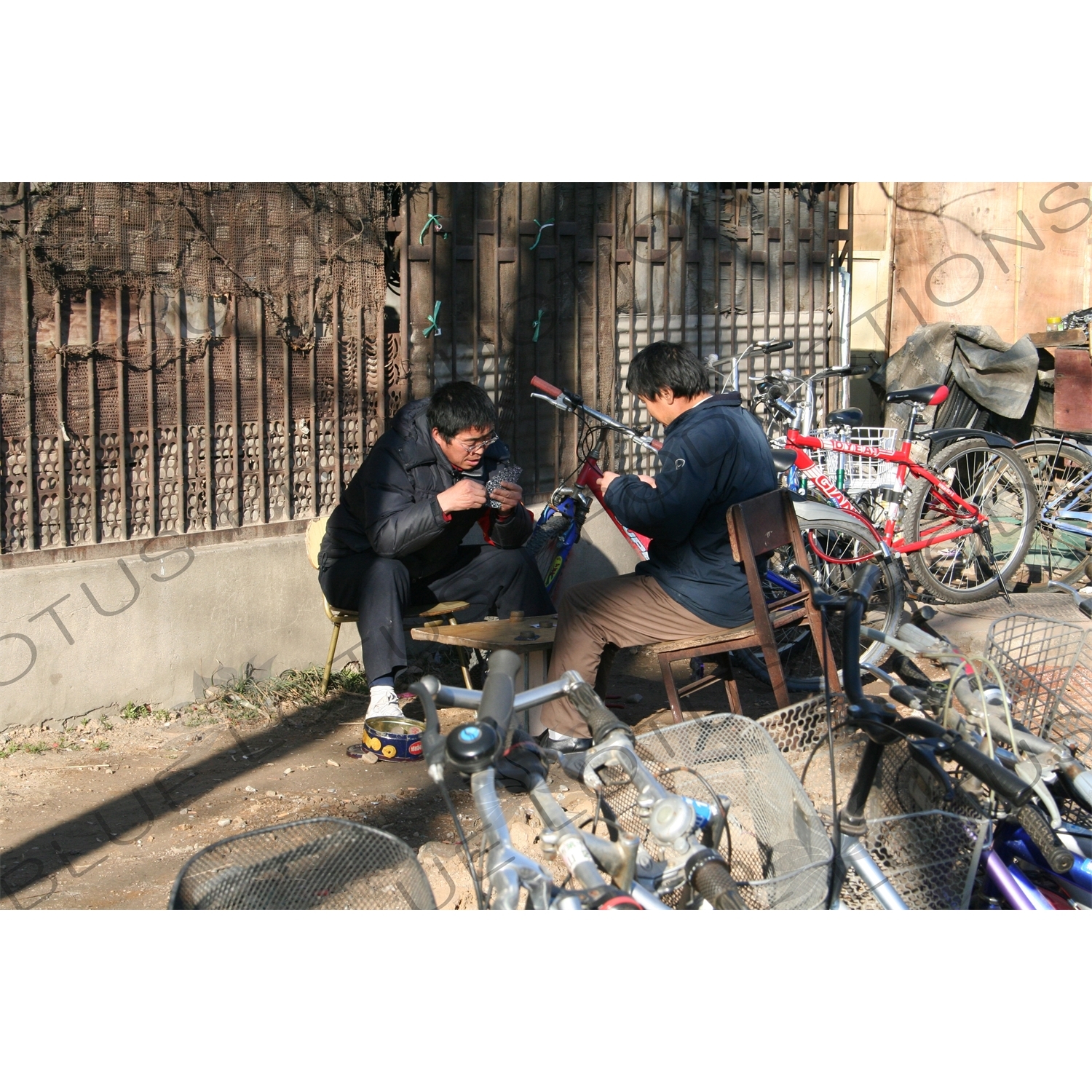 Two Men Playing Cards at the South Gate of the Temple of Heaven (Tiantan) in Beijing