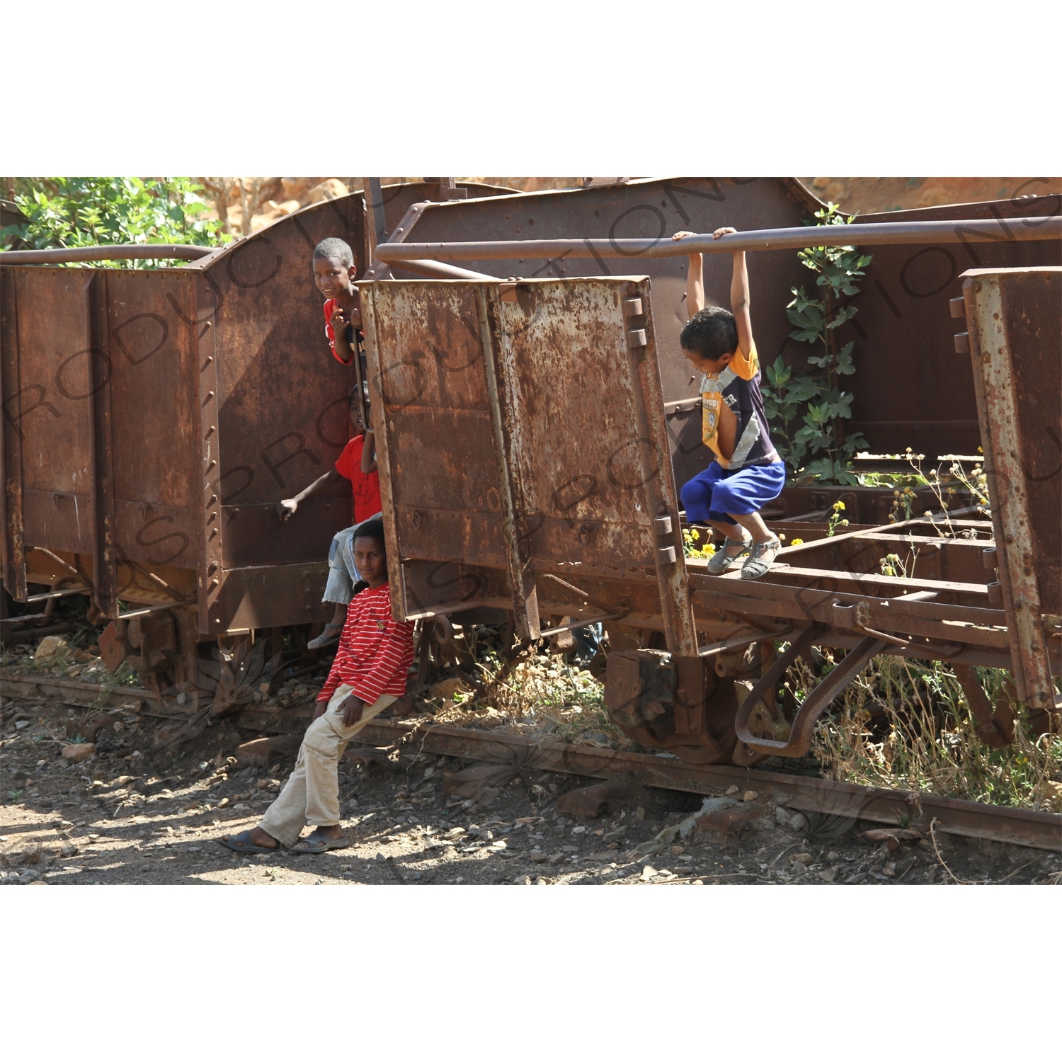 Children Playing on old Railway Cars in a Station along the Asmara to Massawa Railway Line