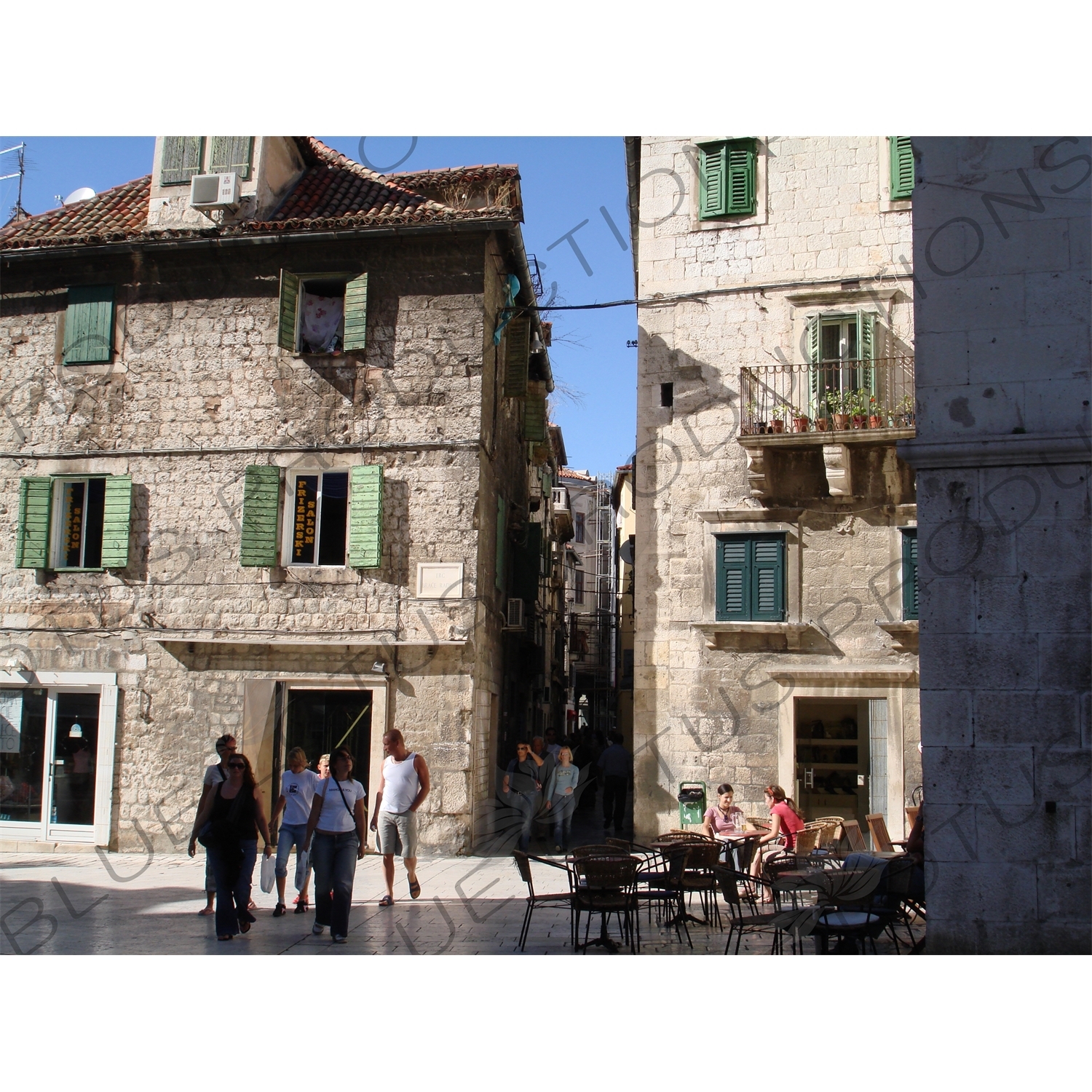 People Walking along a Street in Split