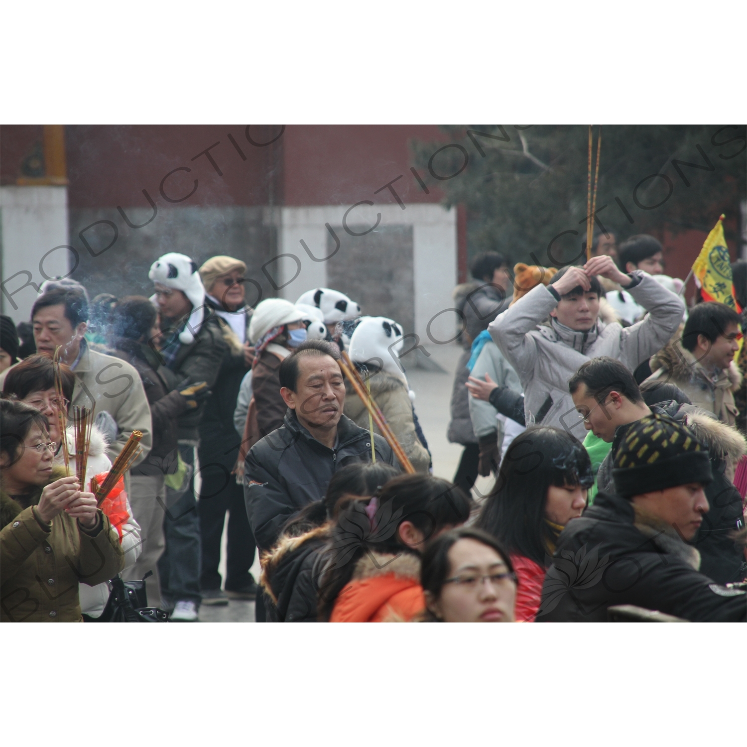 People Burning Incense in the Lama Temple (Yonghegong) in Beijing